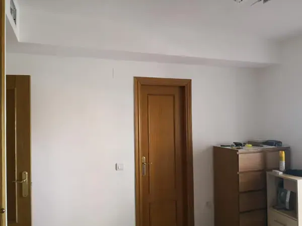 Dormitorio con rejilla de impulsión